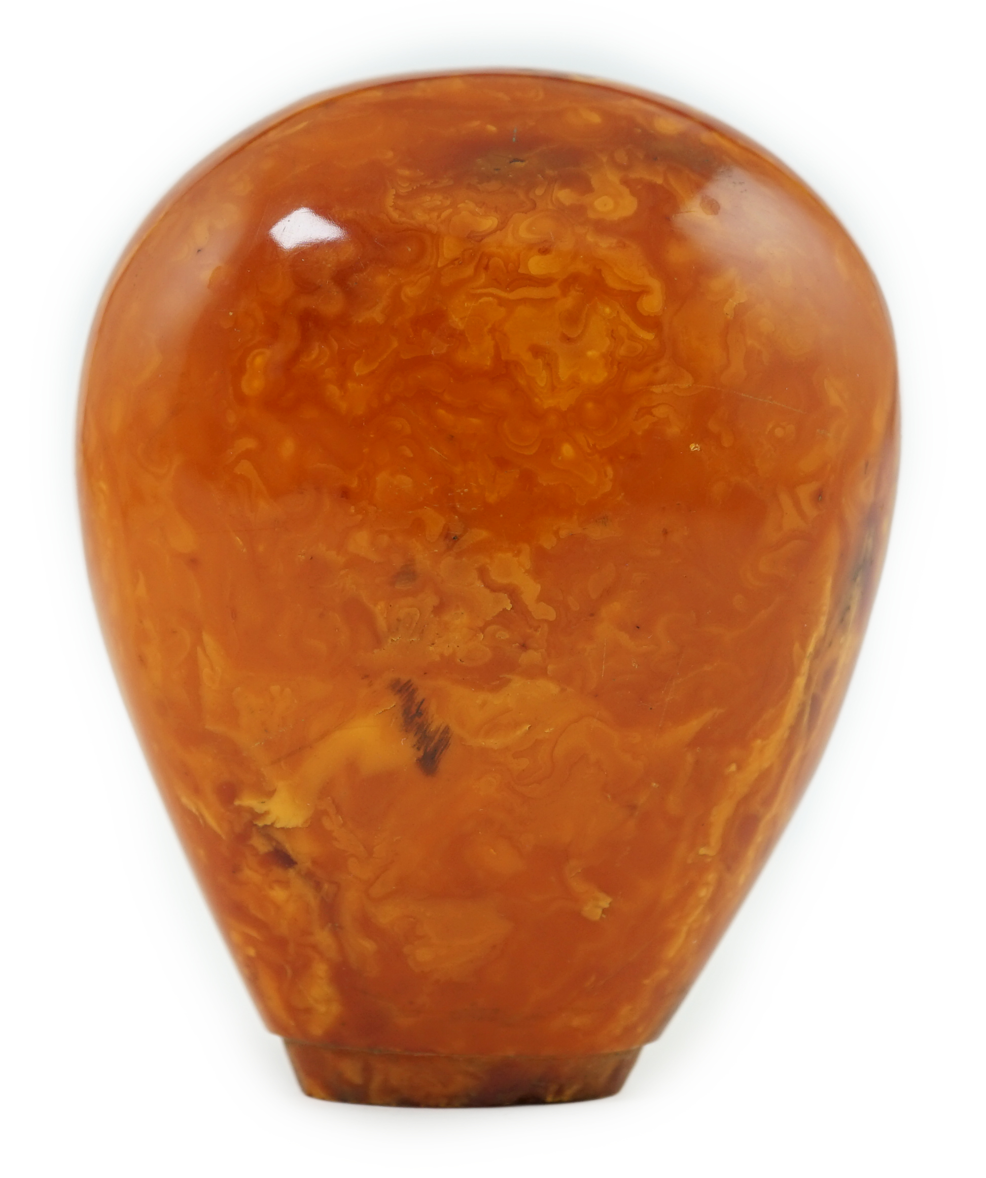 A large amber parasol handle